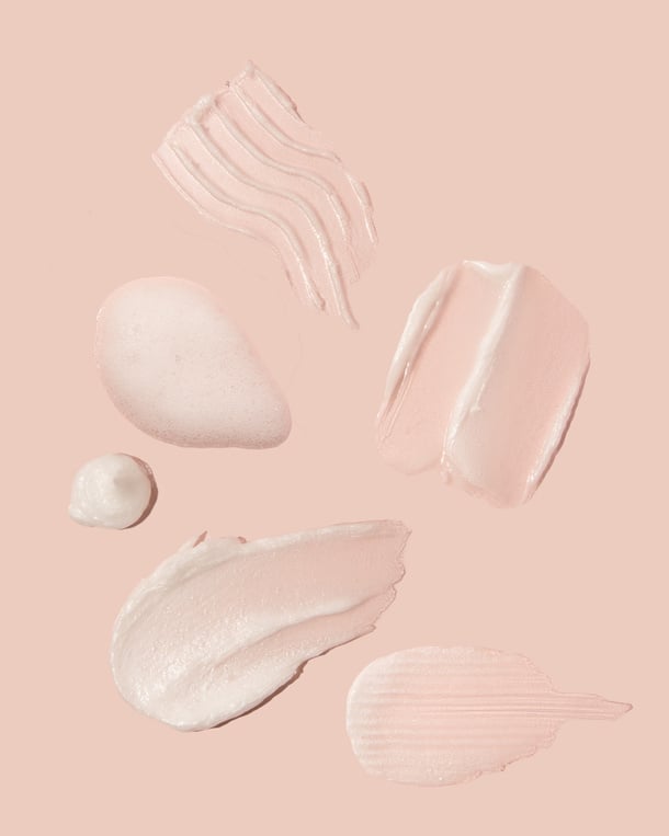 Makeup Swatches on Pastel Pink Background